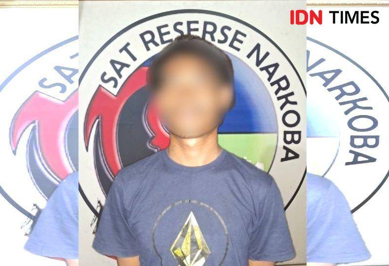 Tersangka RE ketika diamankan di Polres PPU (IDN Times/Ervan)