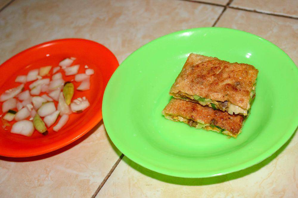 ilustrasi martabak telur (vecteezy.com/Muhammad Yahya )