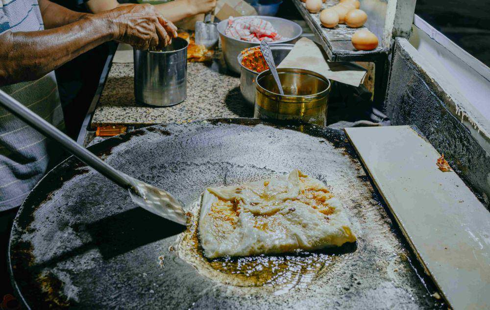 ilustrasi goreng martabak (vecteezy.com/PRIYO DWI )