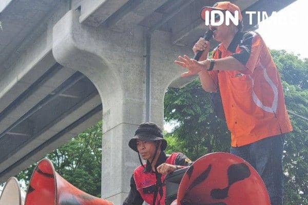 Ilustrasi aksi buruh di Sumsel (IDN Times/Rangga Erfizal)