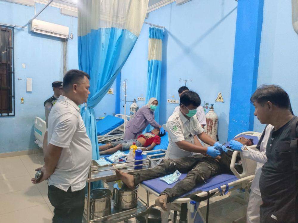 Dua pelaku kekerasan di OKUT tertangkap dan menjadi bulan-bulanan warga (Dok: Polres OKUT)