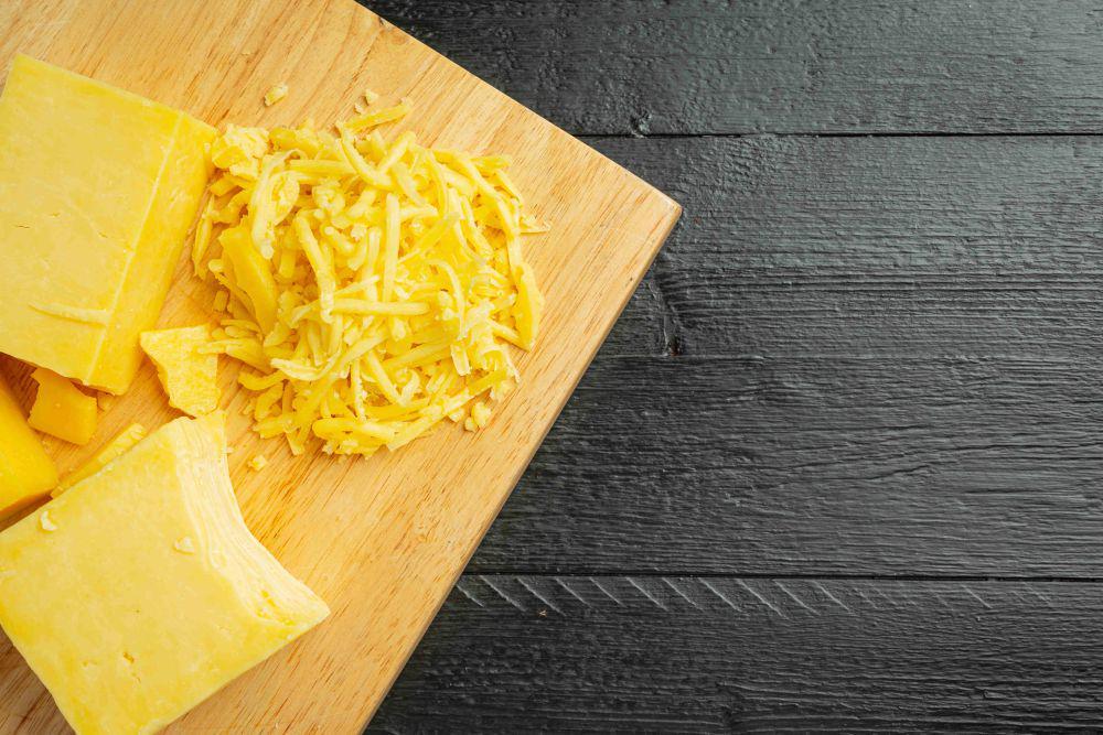 ilustrasi keju cheddar (freepik.com/jcomp)