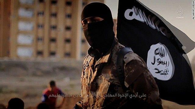 http://cdn.idntimes.com/content-images/post/20151211/141117103601-isis-masked-militant-flag-story-top-855834eb1b4069bdc93b805027e963e7.jpg