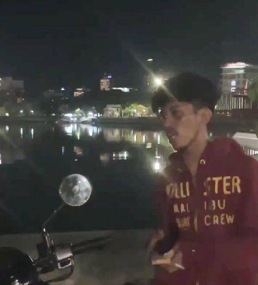 Tangkapan layar video terduga juru parkir liar di kawasan Tugu MNEK, Center Point of Indonesia (CPi)/Istimewa