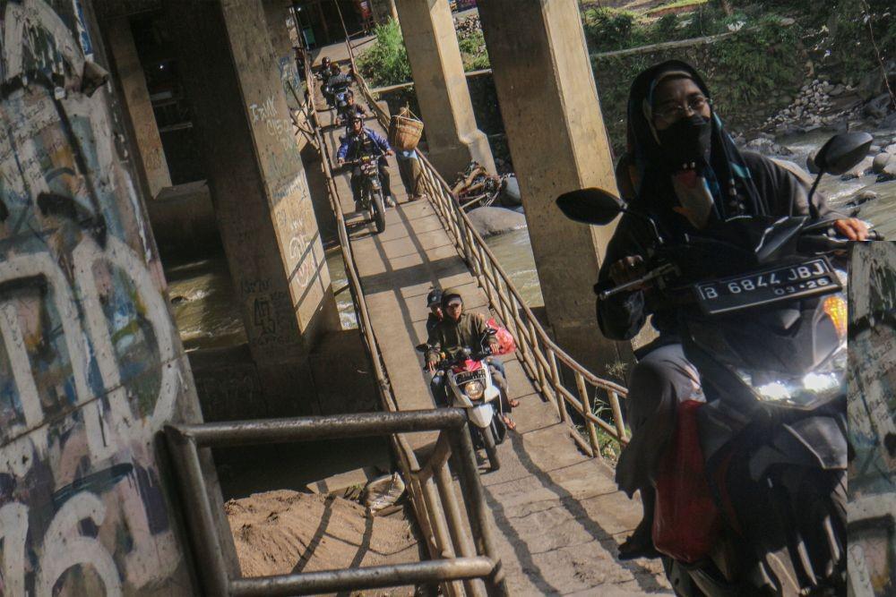 https://cdn.idntimes.com/content-images/post/20220507/rsz-1antarafoto-jalur-alternatif-sepeda-motor-menuju-kawasan-puncak-060522-ysw-5-f6c9d02df66f64c266a1268d66c2e4e1.jpg