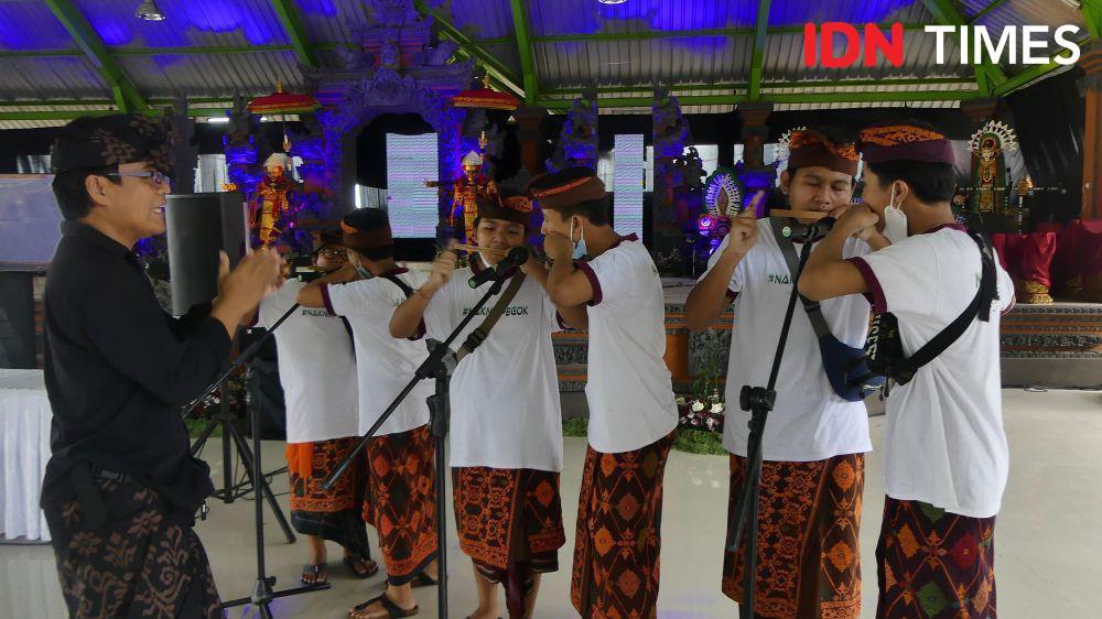 Mengenal Genggong, Instrumen Gamelan Mulut di Denpasar