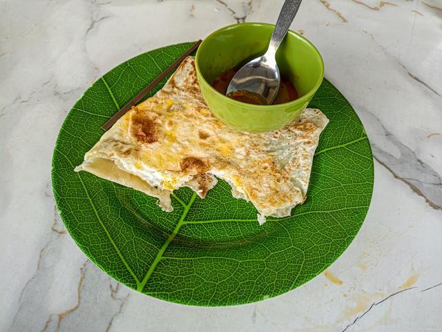 Ilustrasi roti canai khas Malaysia (vecteezy.com/anzzmedia)