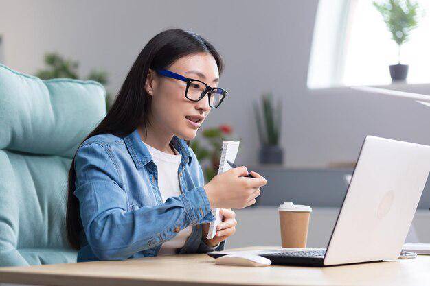 https://www.freepik.com/premium-photo/young-asian-business-coach-teacher-teaches-online-works-office-explains-information-uses_29286041.htm