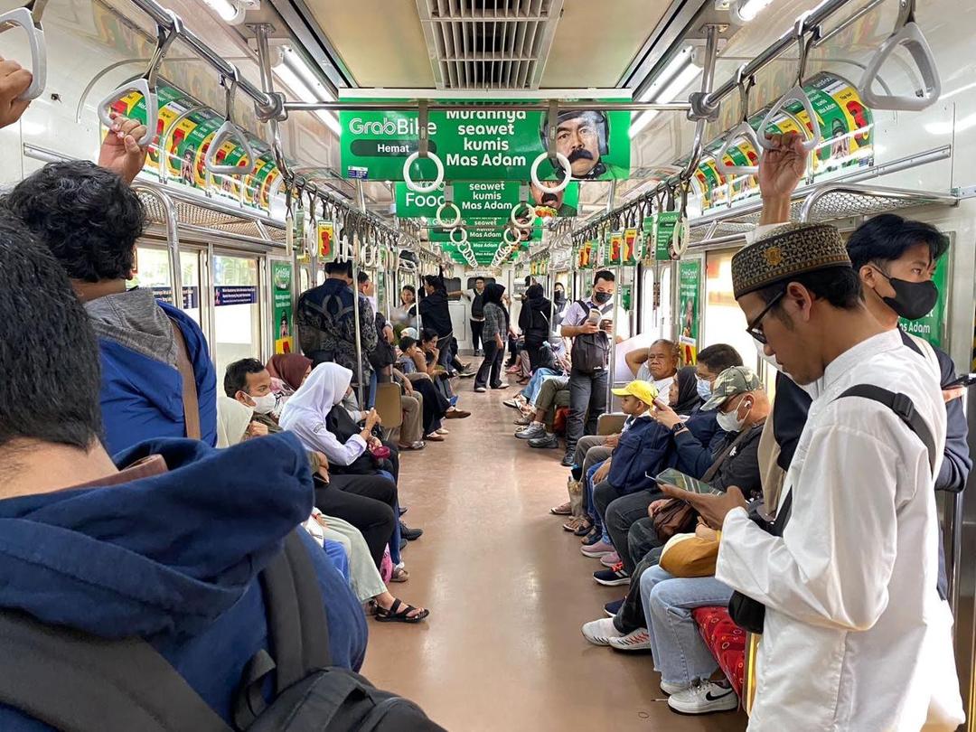 Kampanye Grab "Awet Murah Tiap Hari" di Commuterline