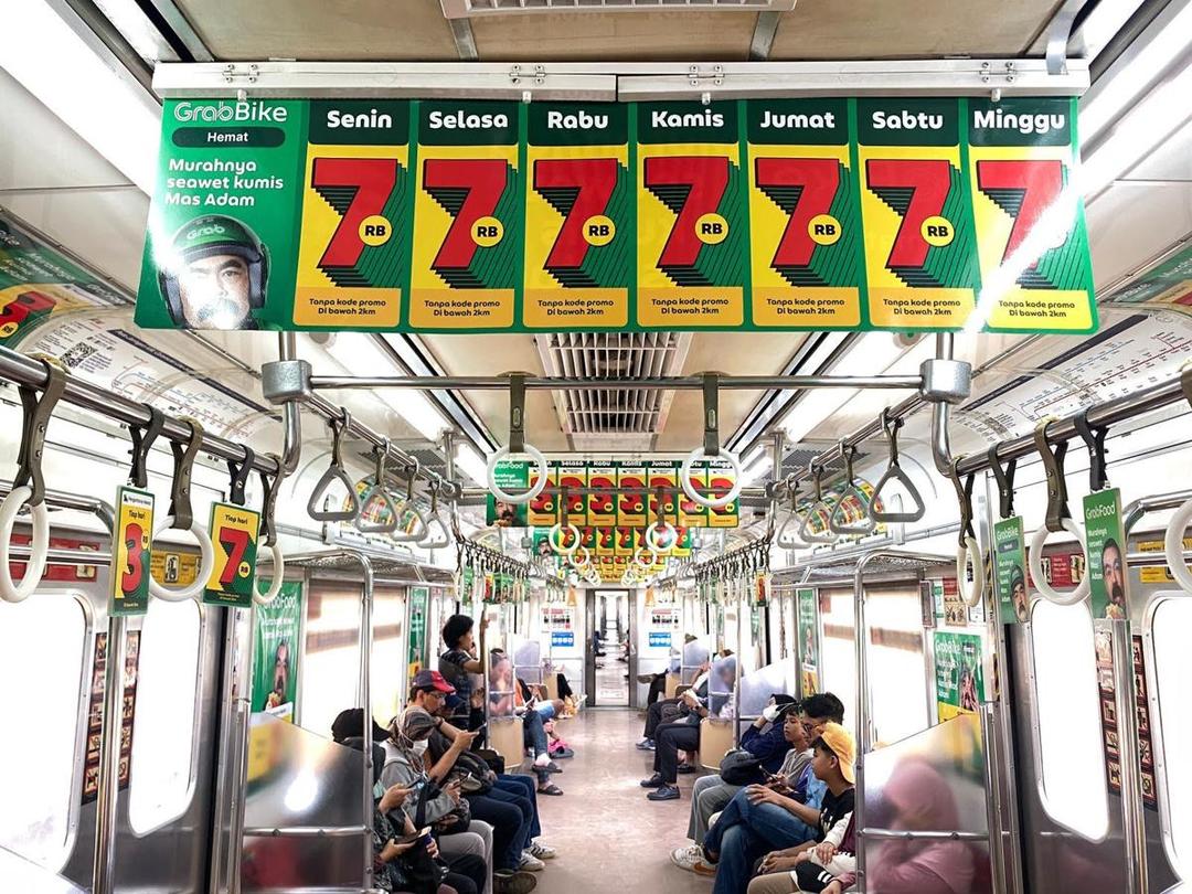 Kampanye Grab "Awet Murah Tiap Hari" di rangkaian Commuterline