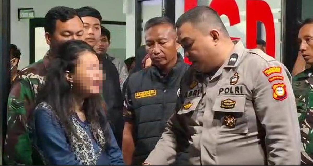 Tangkapan layar video Ibu muda yang diduga membunuh bayinya dengan toples saat diamankan pihak kepolisian. IDN Times/Darsil Yahya