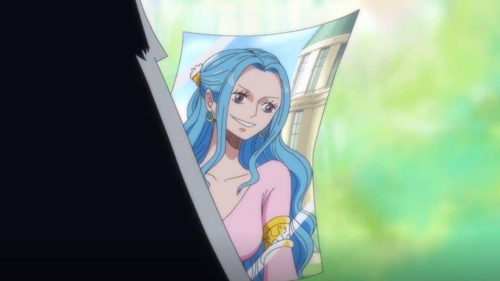 Imu-sama memegang foto yang diperkirakan bernama Nefertari D. Lily (dok. Toei Animation/One Piece)