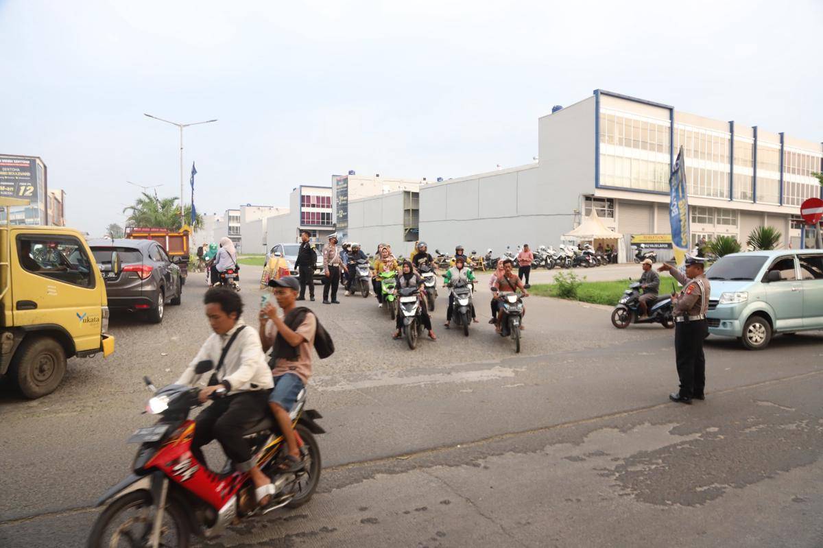 53235operasi-patuh-jaya-2025-lima-ruas-jalan-arteri-di-kota-tangerang-dicanangkan-kawasan-bebas-macet-53235.jpeg
