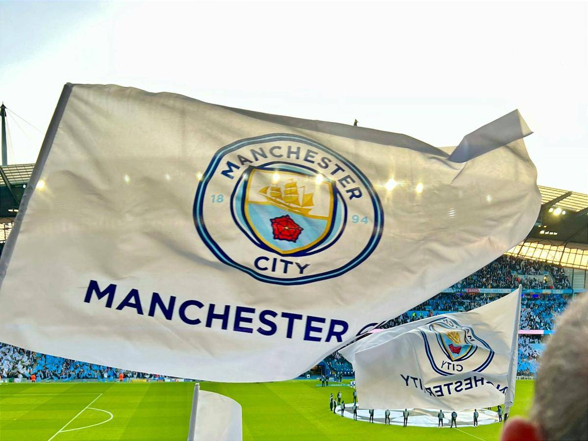 ilustrasi logo Manchester City (unsplash.com/Jonny Gios)