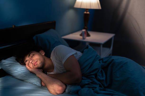 Ilustrasi Pemuda tidur (istockphoto.com/Andrii Lysenko)