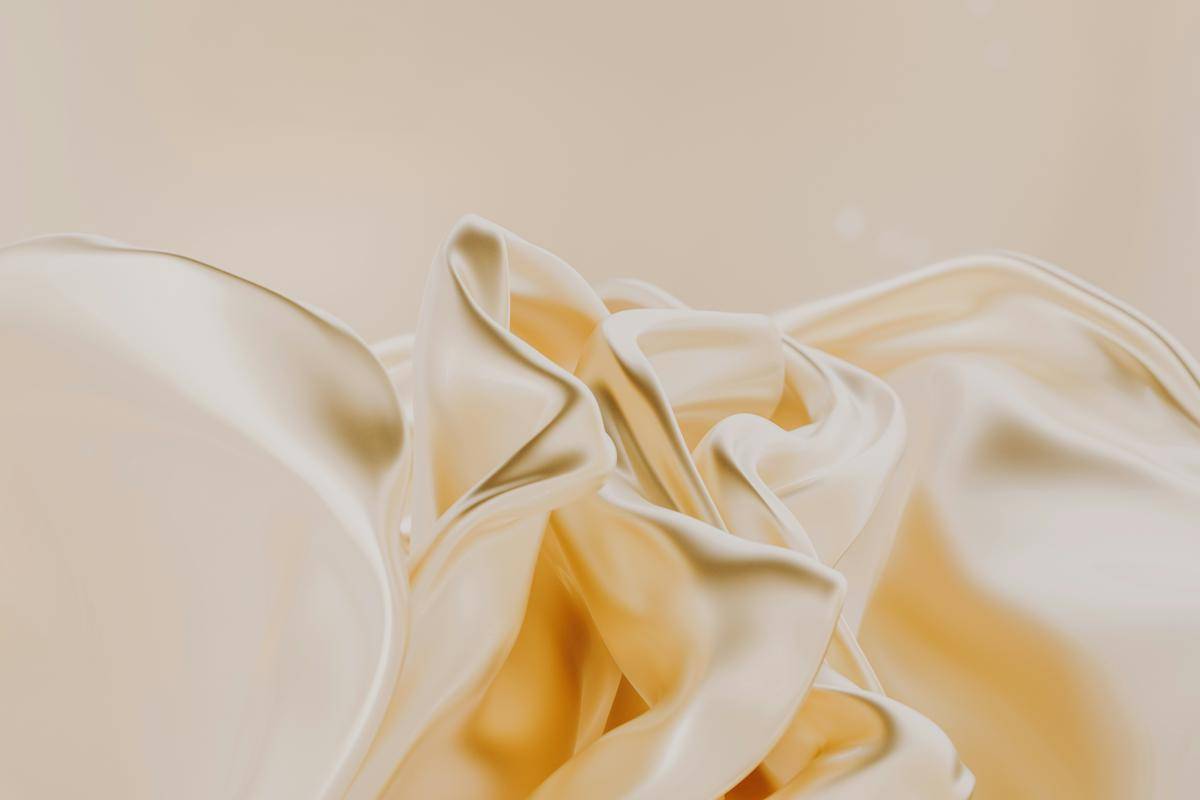 ilustrasi kain warna krem (unsplash.com/Pawel Czerwinski)