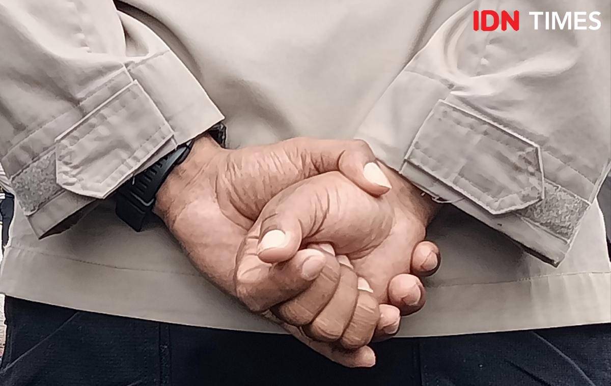 Ilustrasi polisi pelaku pelecehan seksual terhadap korban pemerkosaan di kantor polisi. (IDN Times/Putra F. D. Bali Mula)