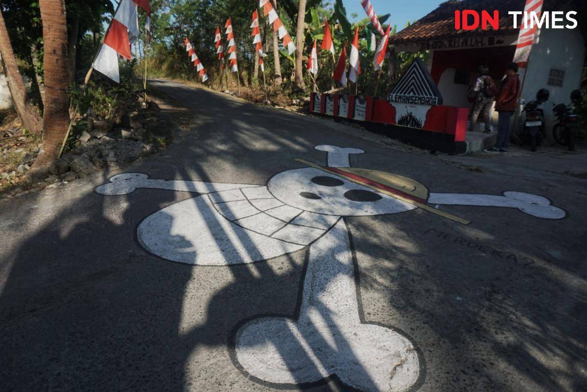 Mural One Piece karya pemuda Karang Taruna Wiryadarma di Temuwuh, Balecatur, Gamping, Sleman