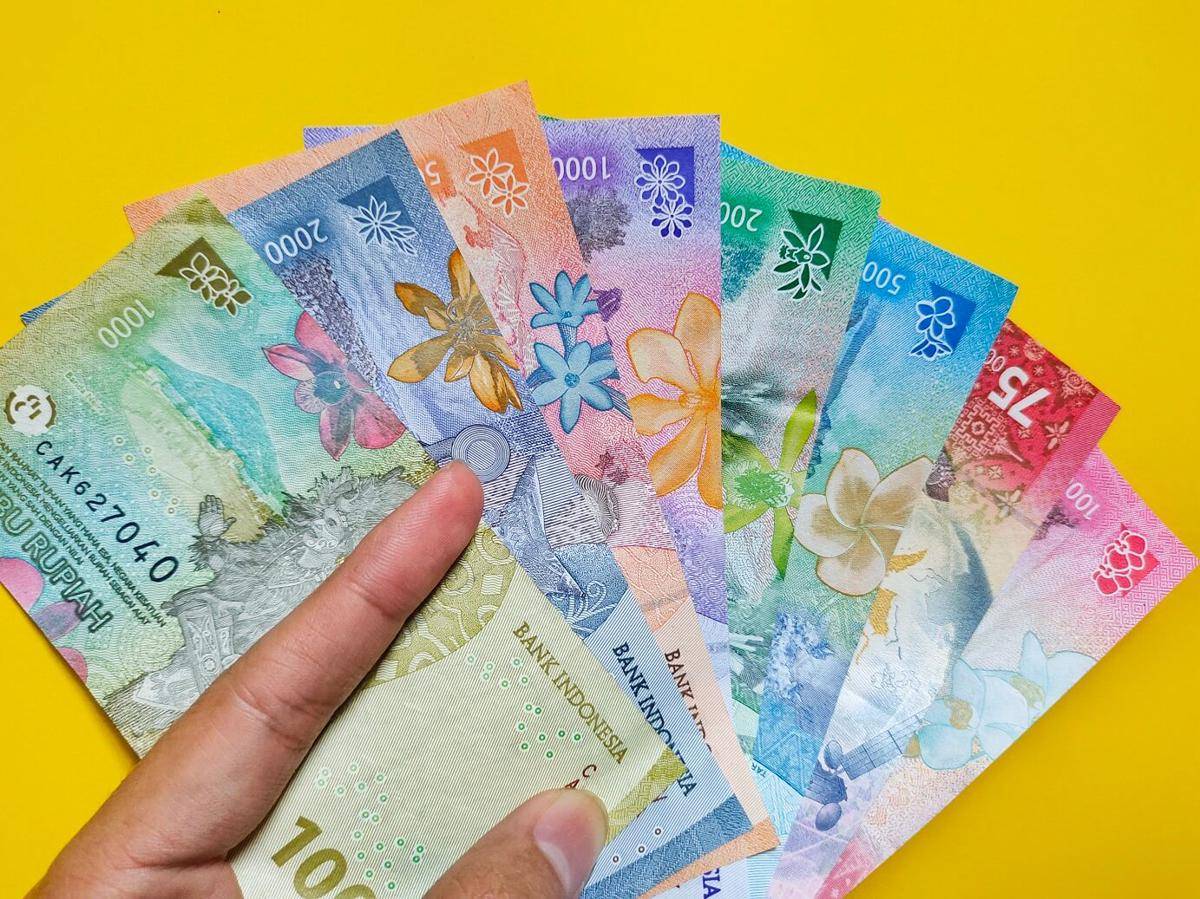 ilustrasi mata uang rupiah (vecteezy.com/Miftachul Huda)