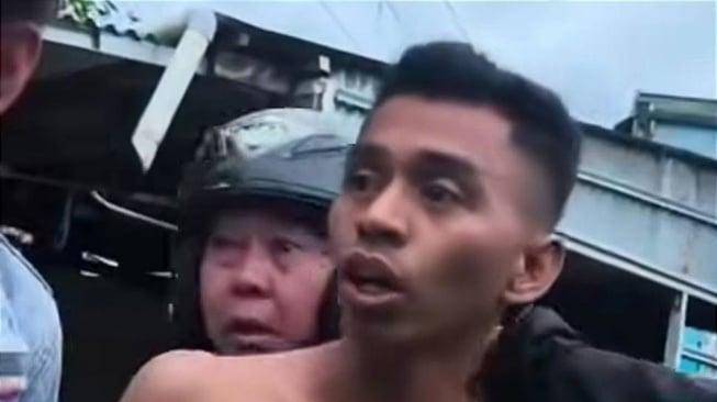 Pembunuh Joel Tanos, Evan Siging, saat ditangkap pihak kepolisian di Kelurahan Sario Utara, Kecamatan Sario, Kota Manado, beberapa waktu lalu.