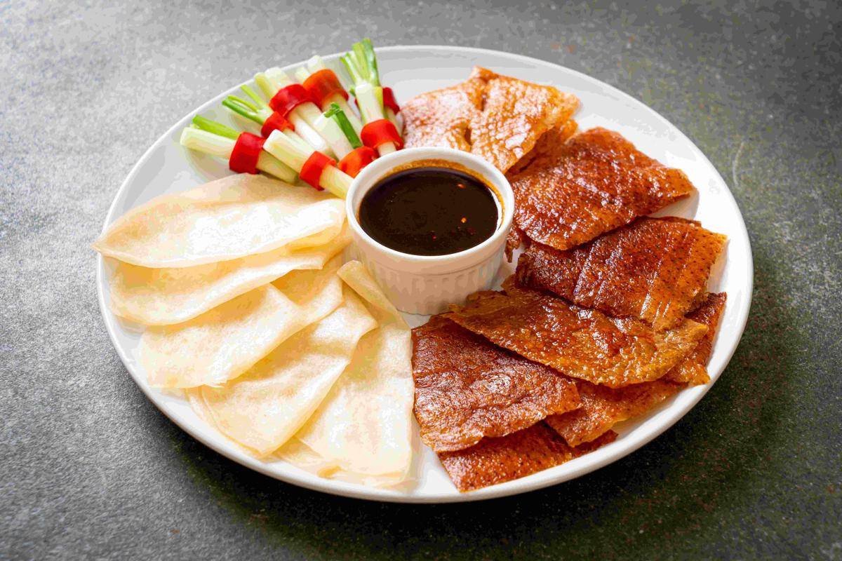 ilustrasi peking duck (vecteezy.com/Natthapon)