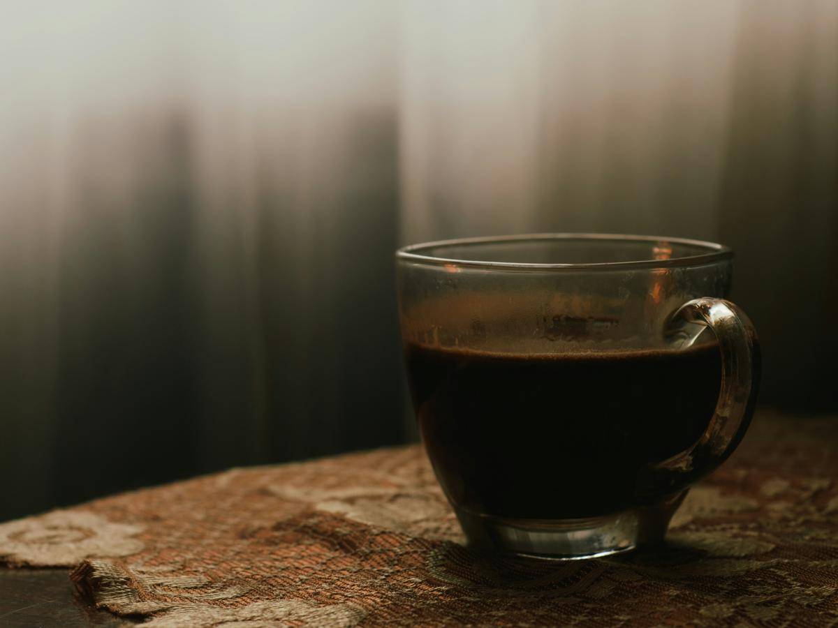 Potret secangkir kopi hitam (unsplash.com/Nader Ayman)