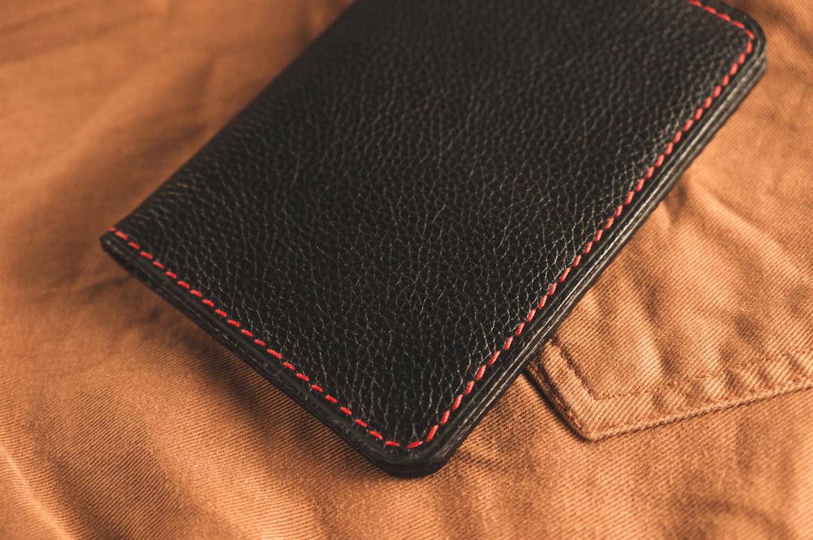 ilustrasi dompet (unsplash.com/Konstantin Evdokimov)