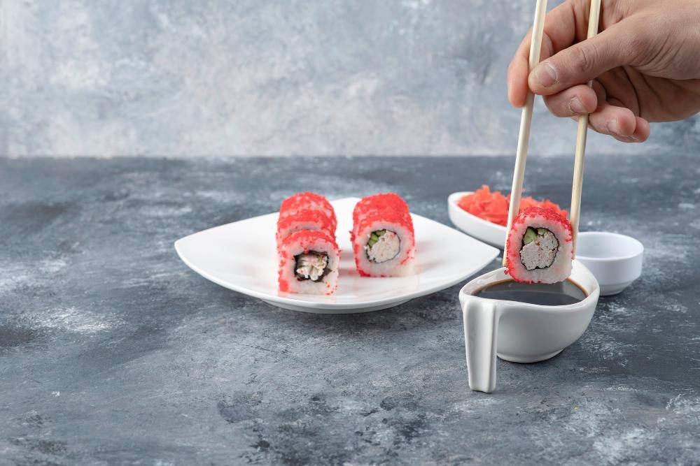 ilustrasi menyantap sushi (freepik.com/azerbaijan-stockers)