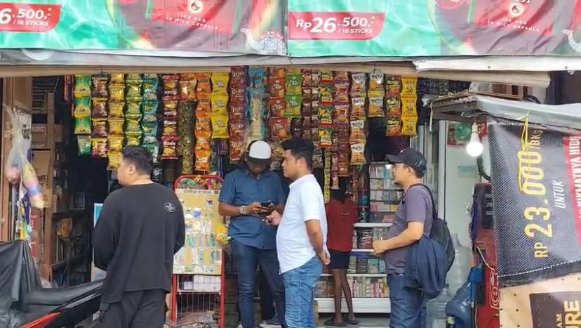 Toko kelontong lokasi pelaku menyetorkan uang palsu untuk mengisi saldo dompet digital DANA. (Dok. Istimewa)