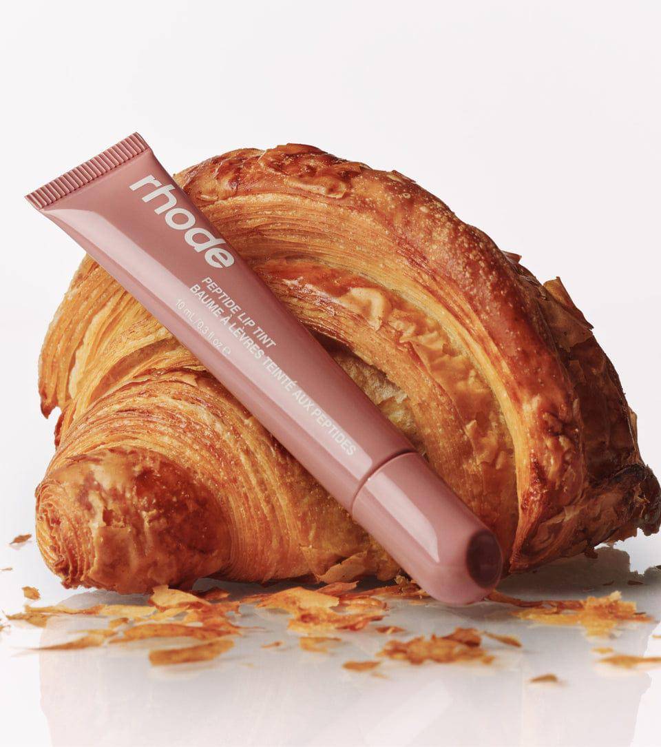 Peptide Lip Tint Toast (rhodeskin.com/Peptide Lip Tint Toast)