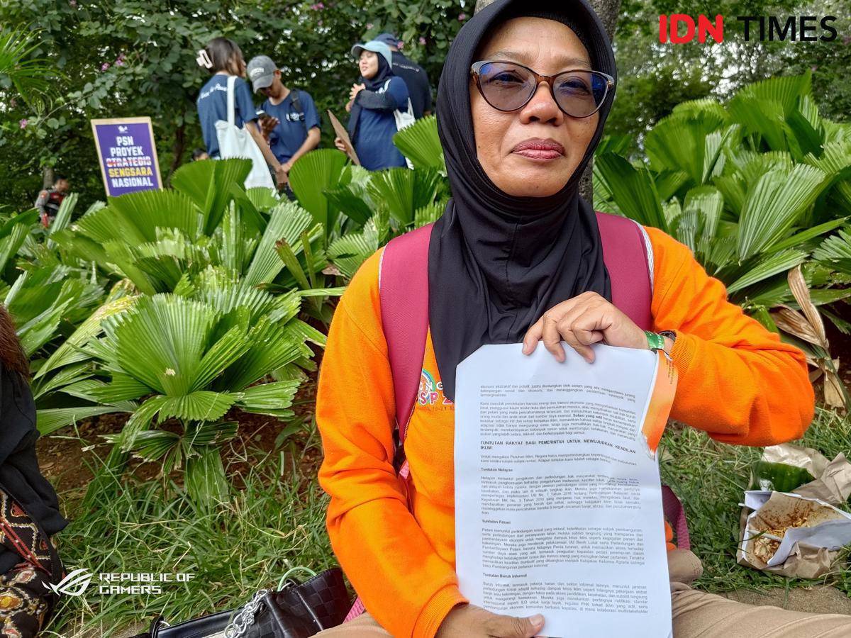 Salah satu peserta pawai rakyat dari Sumsel. (IDN Times)