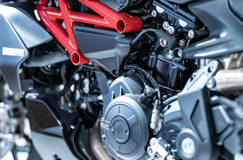 illustrasi mesin motor (unsplash.com/Declan Sun)