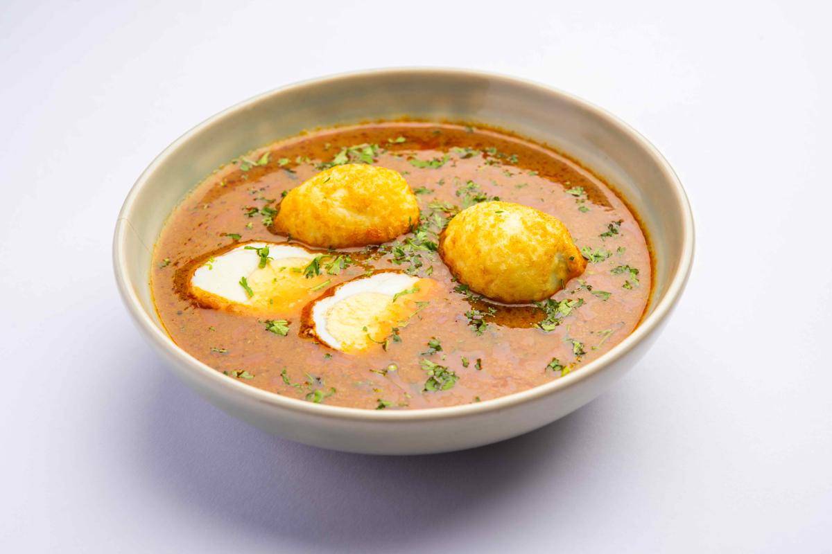 ilustrasi egg curry (vecteezy.com/Subodh Sathe)
