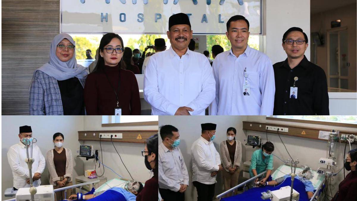 Kakanwil Kemenag Sulsel Ali Yafid menjenguk salah satu korban kebakaran DPRD Makassar, Budi Haryadi di RS Primaya Makassar, Selasa (2/9/2025). (Dok. Kemenag Sulsel)