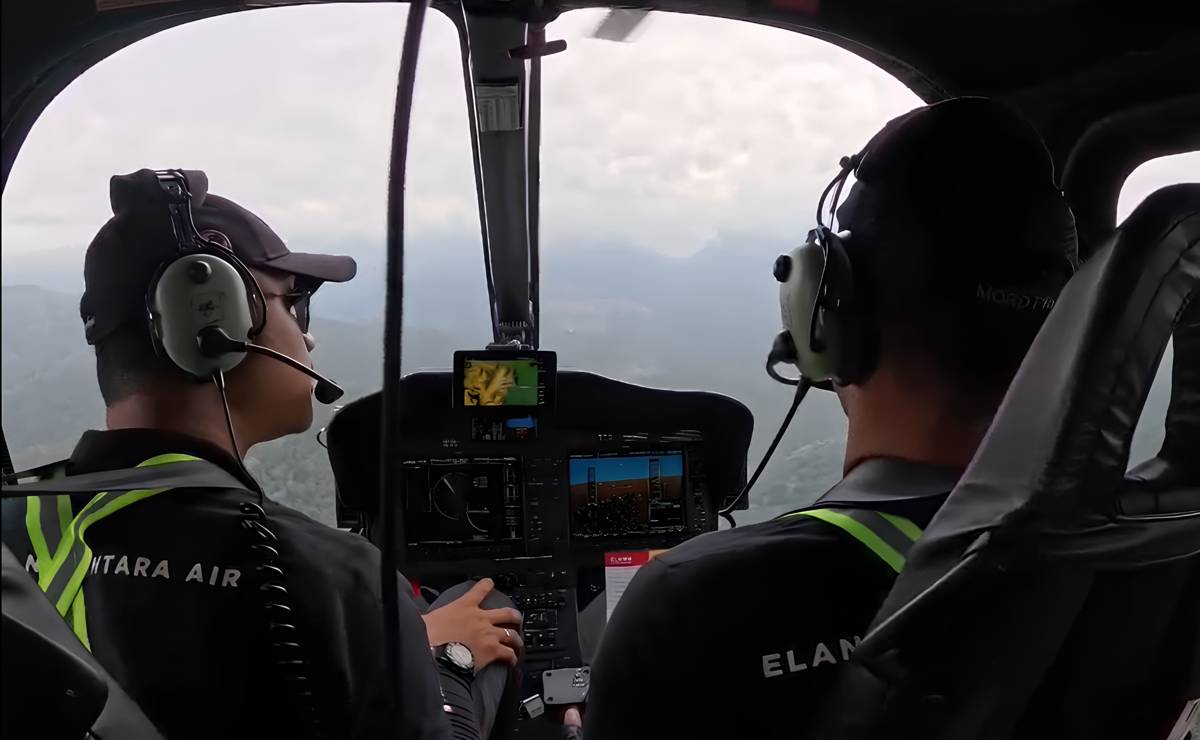 Tim SAR gabungan dari udara sedang melakukan pencarian helikopter hilang di kawasan pegunungan Meratus wilayah Mantewe, Kabupaten Tanah Bumbu, Kalsel. (Tangkapan layar video/Basarnas Banjarmasin)