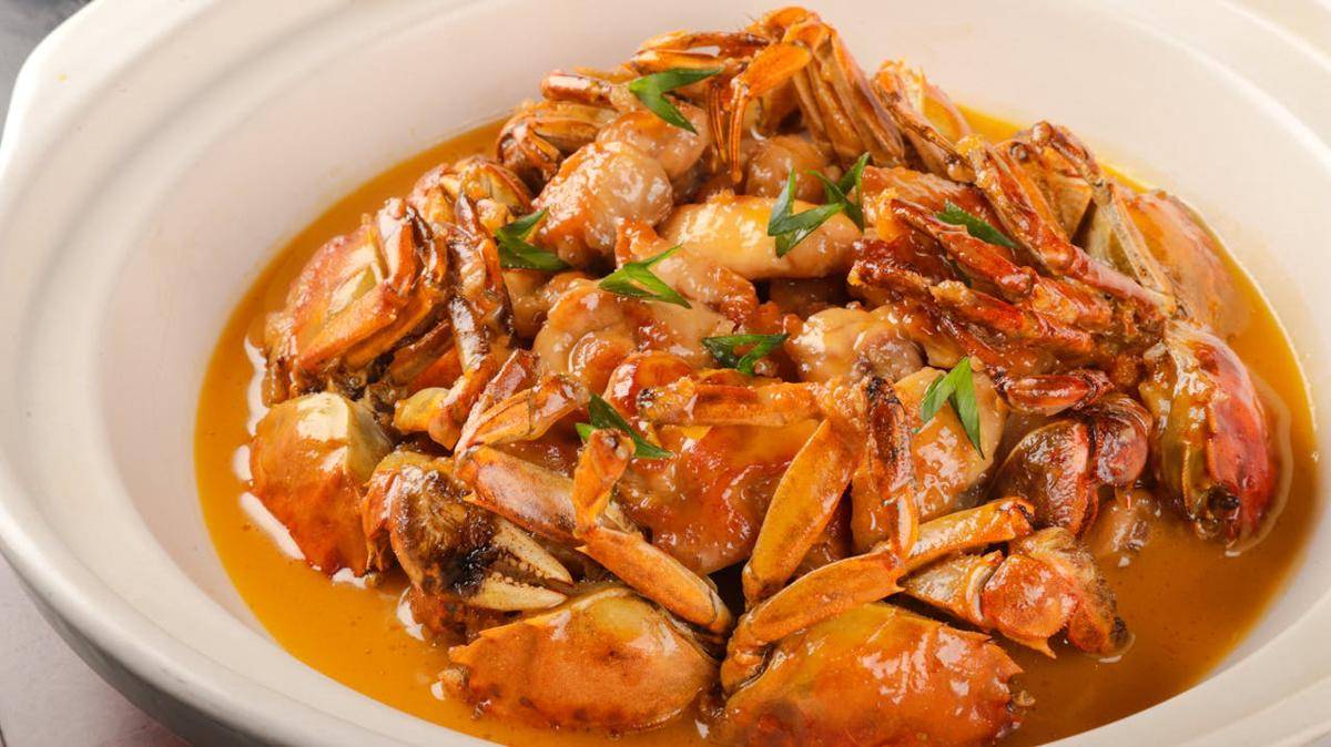 ilustrasi kepiting saus padang pedas manis