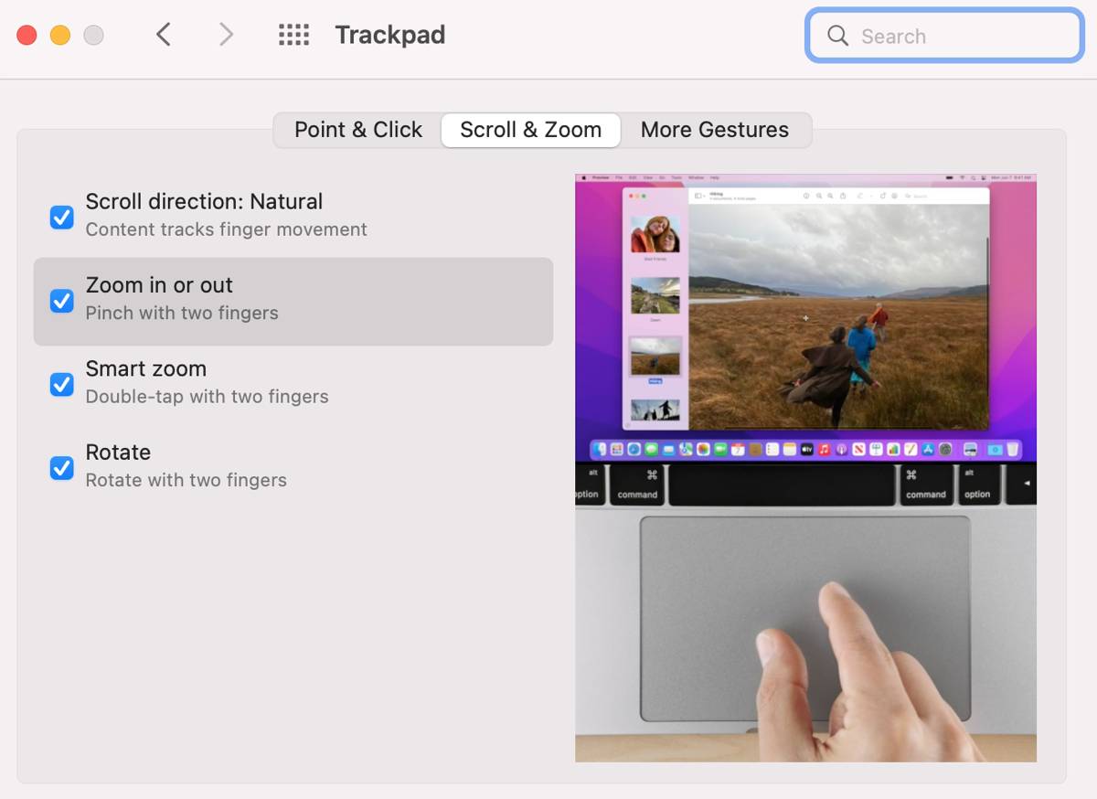 mengatur preferensi trackpad di System Settings (