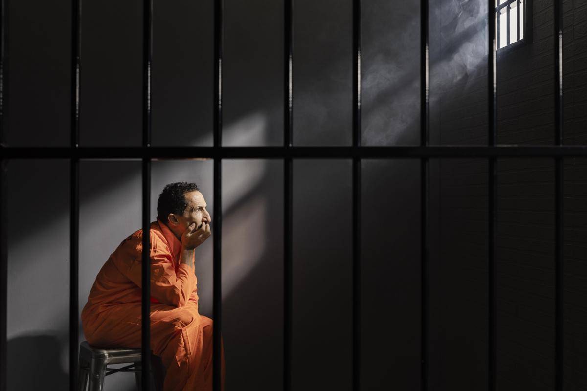 middle-aged-man-spending-time-jail.jpg