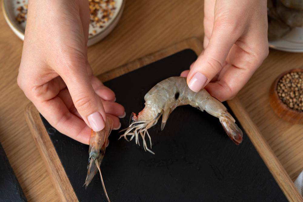 ilustrasi kaki dan kepala udang (freepik.com/freepik)