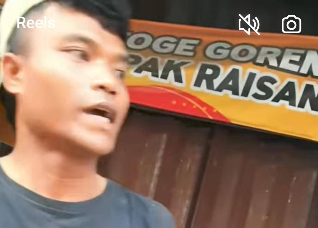 Juru parkir liar.jpg