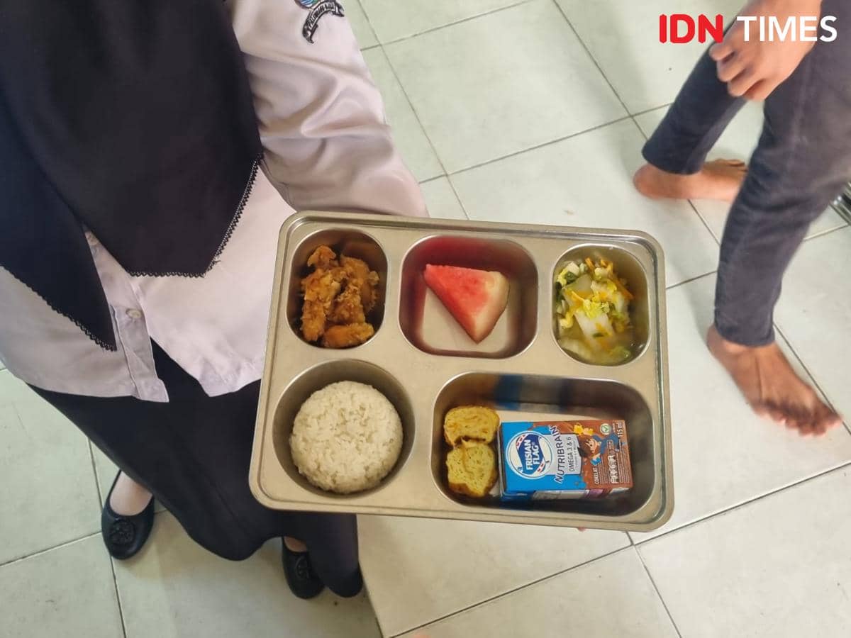 Ilustrasi pelaksanaan program Makan Bergizi Gratis atau MBG, sebuah program penyediaan makanan bergizi.