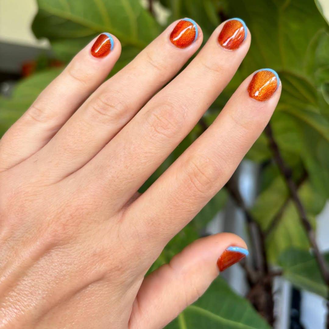 Ide nail art cat-eye orange (instagram.com/l_lavendernails)