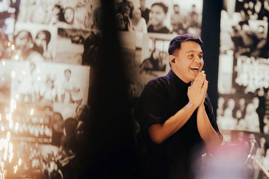 Potret penyanyi Tulus