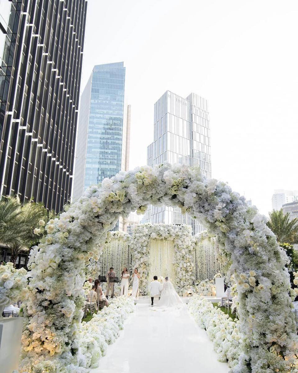 Amidst Jakarta’s quiet heart, Amanda and Kenny wed, a vision in white and lace, tailored grace a (1).jpg