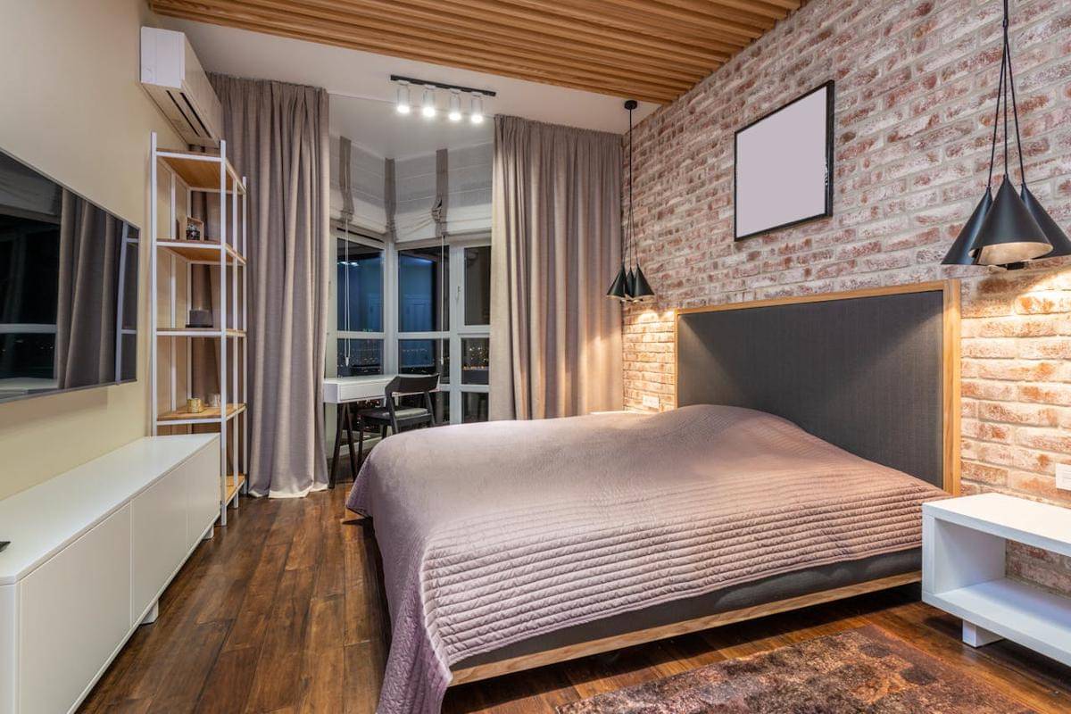 https://www.pexels.com/photo/bedroom-interior-with-furniture-and-tv-in-flat-7018253/