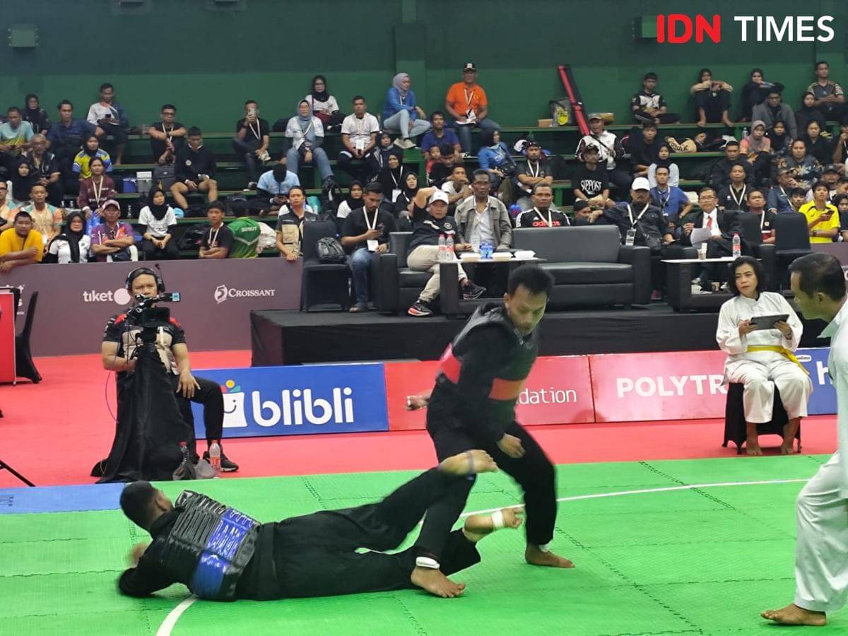 Pesilat Lampung, M. Wildan saat bertanding di PON Beladiri Kudus. (IDN Times/Muhaimin)