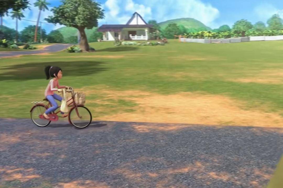 Kak Ros bersepeda di jalanan kampung