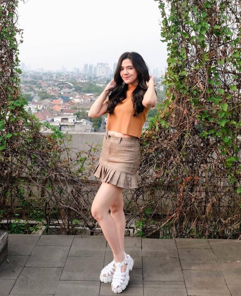 Putri Una