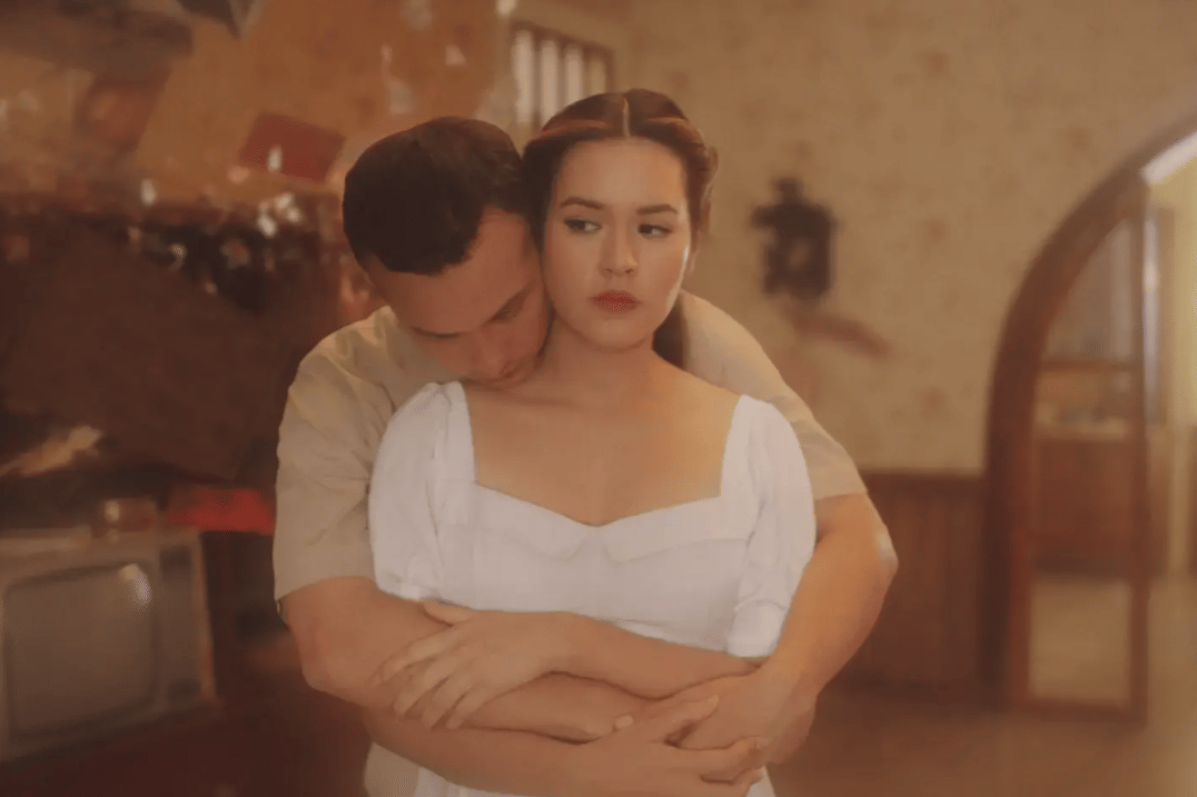 Raisa dan Nicholas Saputra dalam musik video "Nyaman Tak Cukup"