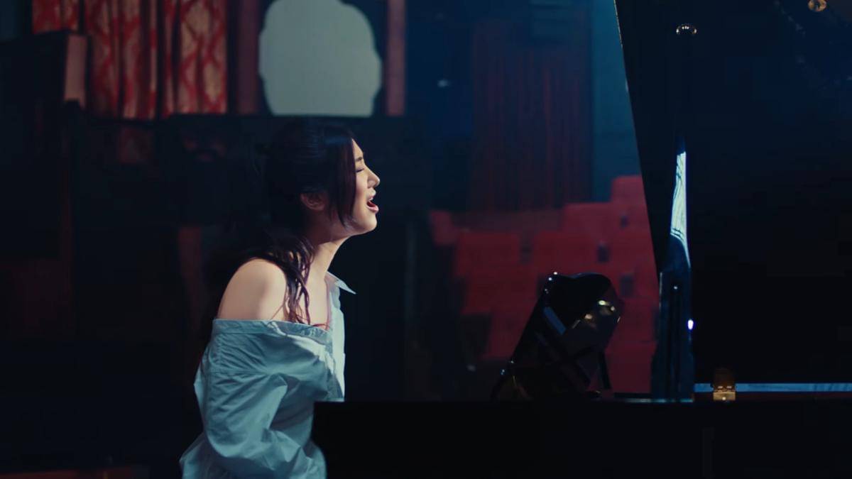 Ejae di MV In Another World (youtube.com/ejaeofficial)